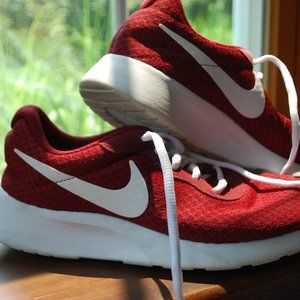 dark red Nike shoes